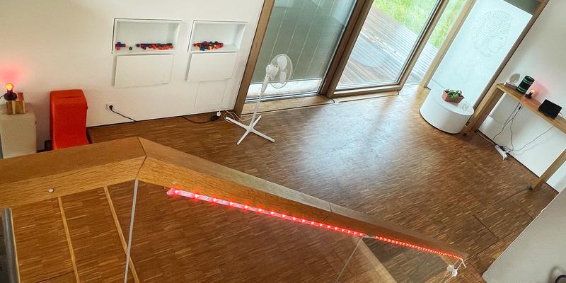 View of the Smart Home eHUB with red illuminated handrail on the banister.